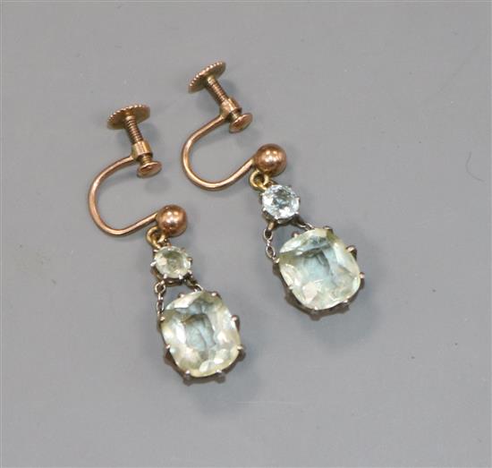 A pair of yellow metal and aquamarine set drop ear clips, 19mm.